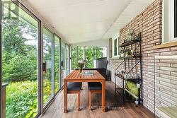 Sun Room off of the deck/back of home - 