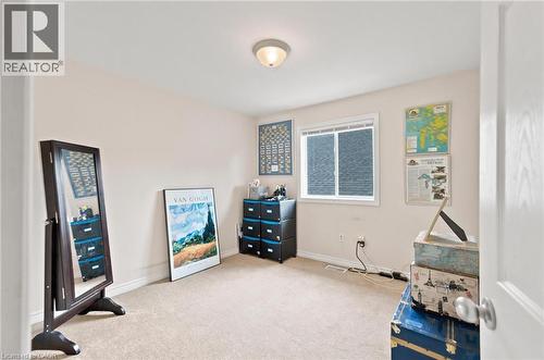 Bedroom featuring neutral wall colours and carpet flooring - 207 Valridge Drive, Ancaster, ON - Indoor