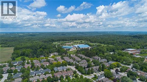 Residential neighborhood featuring numerous detached homes with mature landscaping, surrounded by extensive green spaces and wooded areas - 207 Valridge Drive, Ancaster, ON - Outdoor With View