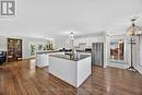 Kitchen open to family & dining room - 2174 Atkinson Road, Springwater, ON 