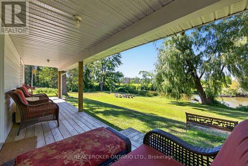 Covered Back Porch & View - 2174 Atkinson Road, Springwater, ON 