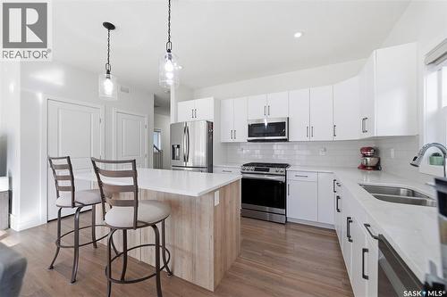 319 Skopik Crescent, Saskatoon, SK - Indoor Photo Showing Kitchen With Double Sink With Upgraded Kitchen