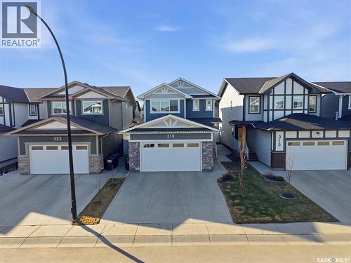 319 Skopik Crescent, Saskatoon, SK - Outdoor With Facade