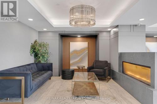 136 - 5055 Greenlane Road, Lincoln, ON - Indoor With Fireplace