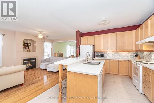 26 Delray Drive E, Markham, ON - Indoor Photo Showing Kitchen With Fireplace With Double Sink