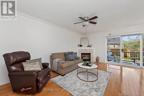 11 Decaria Boulevard, Perth, ON - Indoor Photo Showing Living Room With Fireplace