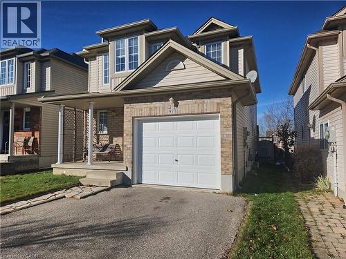 View of front of property featuring a porch - 973 Atlantic Boulevard, Waterloo, ON - Outdoor