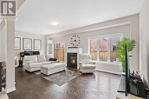 46 Dolobram Trail, Brampton, ON - Indoor Photo Showing Living Room With Fireplace