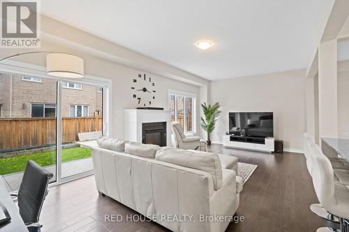 46 Dolobram Trail, Brampton, ON - Indoor Photo Showing Living Room With Fireplace