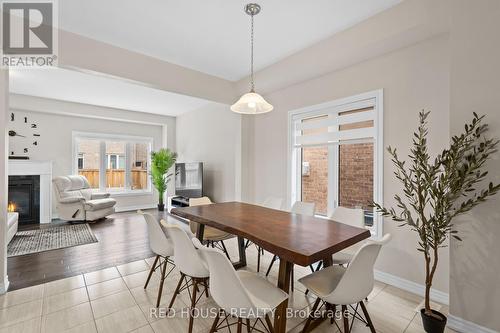 46 Dolobram Trail, Brampton, ON - Indoor Photo Showing Dining Room With Fireplace