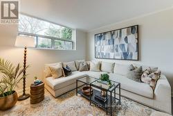LOWER - 225 WOODVILLE AVENUE Toronto, ON M4J 2R4