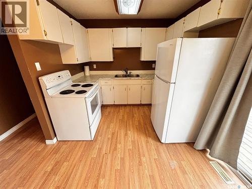 3805 Diefenbaker Drive, Saskatoon, SK - Indoor Photo Showing Kitchen With Double Sink