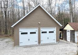 Detached 24' x 30' insulated and heated garage - 