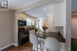 Kitchen with breakfast bar - 