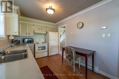 26 - 1 Paradise Boulevard, Ramara, ON - Indoor Photo Showing Kitchen With Double Sink