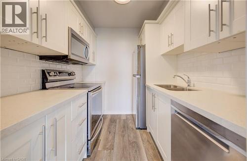 Updated Kitchen - 1414 King Street E Unit# 802, Kitchener, ON - Indoor Photo Showing Kitchen With Stainless Steel Kitchen With Double Sink