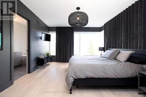 Primary features ensuite & walk-in closet. - 330 Kenwood Avenue, Ottawa, ON - Indoor Photo Showing Bedroom