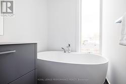 Free standing soaker tub. - 