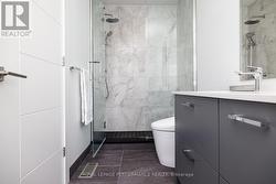 Enclosed rain shower & Toto smart toilet. - 