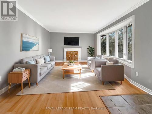Upper Unit Living Room -Virtually Staged - 925 Moorvale Street, Ottawa, ON - Indoor Photo Showing Living Room With Fireplace
