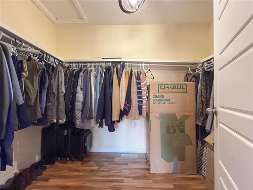 28 White Ash Drive, Brandon, MB - Indoor With Storage