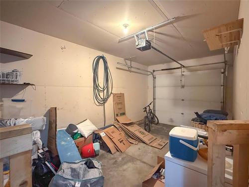 28 White Ash Drive, Brandon, MB - Indoor Photo Showing Garage