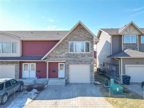 28 White Ash Drive, Brandon, MB - Outdoor With Facade
