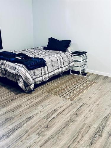 16 Oxford Bay, Thompson, MB - Indoor Photo Showing Bedroom