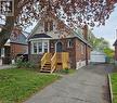 Brick exterior featuring a new wooden front deck - 75 Barons Avenue S, Hamilton, ON  - Outdoor 