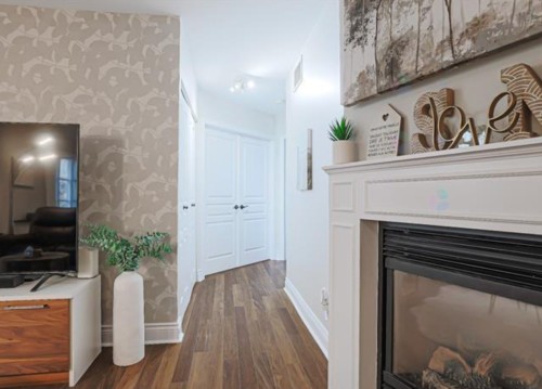 Corridor - 205-10 Rue Des Manoirs, Charlemagne, QC - Indoor With Fireplace