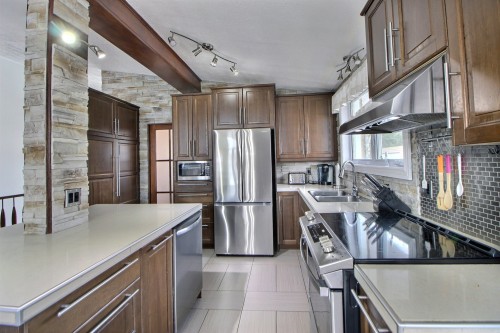 Cuisine - 22 6E Avenue E., Amos, QC - Indoor Photo Showing Kitchen With Double Sink