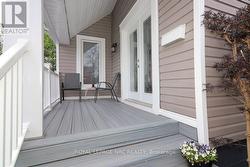 Front Porch with Indirect Water Views - 