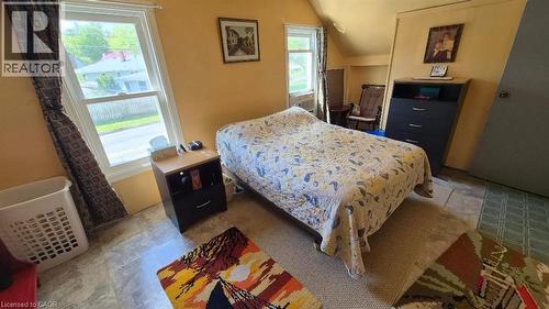 Room featuring two windows, neutral wall color. - 257 Cedar Street, Simcoe, ON - Indoor Photo Showing Bedroom
