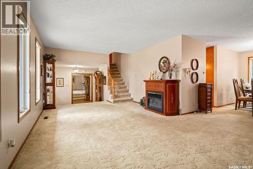 287 Hodgins Crescent N, Regina, SK - Indoor With Fireplace