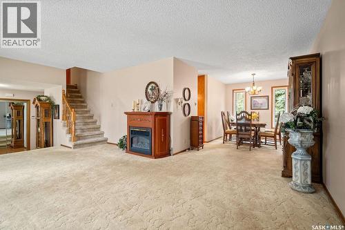 287 Hodgins Crescent N, Regina, SK - Indoor With Fireplace