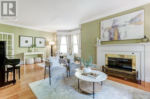 Exceptionally large living room with gas fireplace - 103 Queen Street, St. Catharines (Downtown), ON - Indoor Photo Showing Living Room With Fireplace