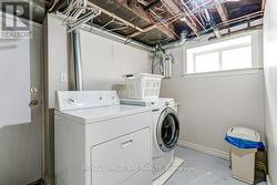 LLl laundry with access to stairs to backyard - 