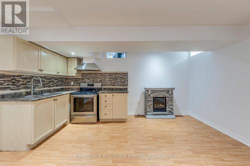 67 Rusty Trail, Vaughan, ON - Indoor Photo Showing Kitchen With Fireplace