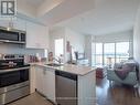 608 - 560 North Service Road, Grimsby (Grimsby Beach), ON  - Indoor Photo Showing Kitchen With Double Sink 