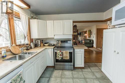 103 Birch Point Dr|Laird Township, Echo Bay, ON - Indoor Photo Showing Kitchen With Double Sink