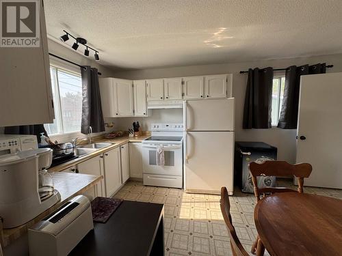 38 Richard St, Chapleau, ON - Indoor Photo Showing Kitchen With Double Sink