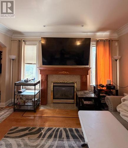Living Room with gas fireplace - 1221 Anoka Street, Ottawa, ON - Indoor Photo Showing Living Room With Fireplace