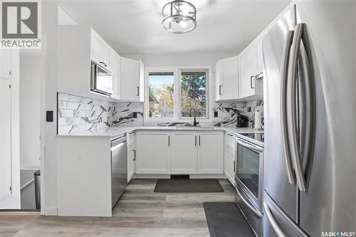 245 Orchard Crescent, Regina, SK - Indoor Photo Showing Kitchen With Double Sink