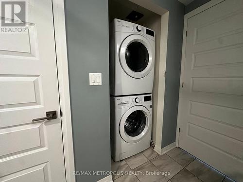 Ensuite Laundry - 301 - 58 Adam Sellers Street, Markham, ON - Indoor Photo Showing Laundry Room