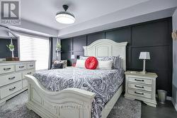 Spacious primary bedroom offers a private ensuite - 