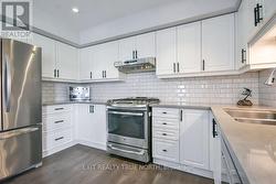 S/S appliances and lots of cabinet space - 