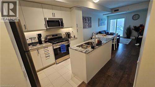 5 Spooner Crescent Unit# 314, Collingwood, ON - Indoor Photo Showing Kitchen With Stainless Steel Kitchen With Double Sink