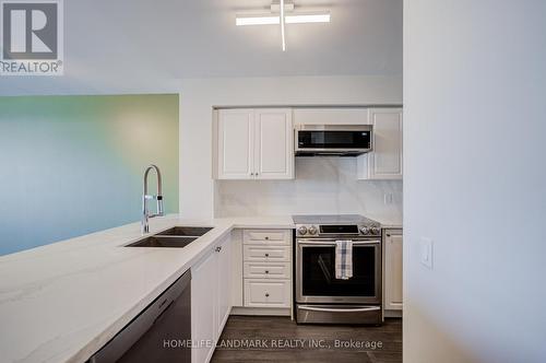 317 - 9017 Leslie Street, Richmond Hill, ON - Indoor Photo Showing Kitchen With Double Sink With Upgraded Kitchen