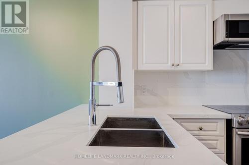 317 - 9017 Leslie Street, Richmond Hill, ON - Indoor Photo Showing Kitchen With Double Sink