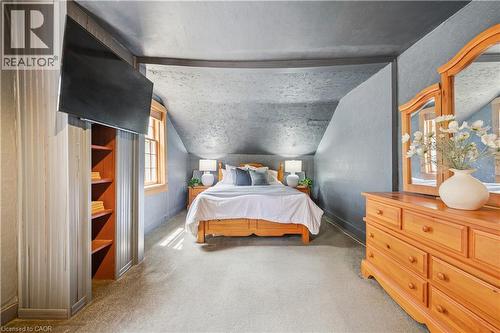 Carpeted room with a pitched ceiling and sloped walls - 630 Robert Ferrie Drive, Kitchener, ON - Indoor Photo Showing Bedroom